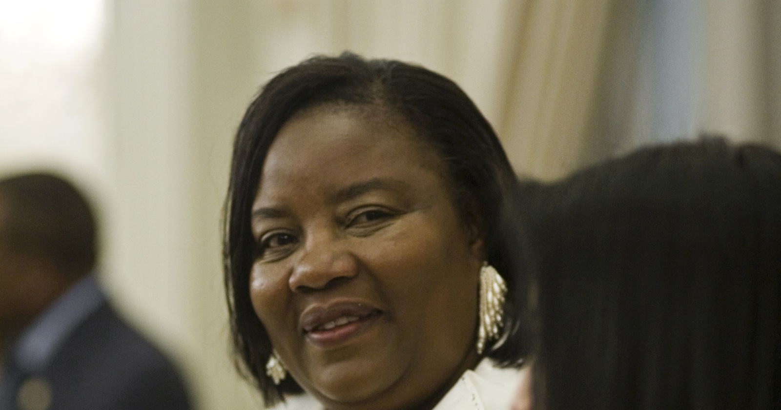 Ida Odinga wearing a white jacket and pearl necklace, in a February 2010 file photograph.