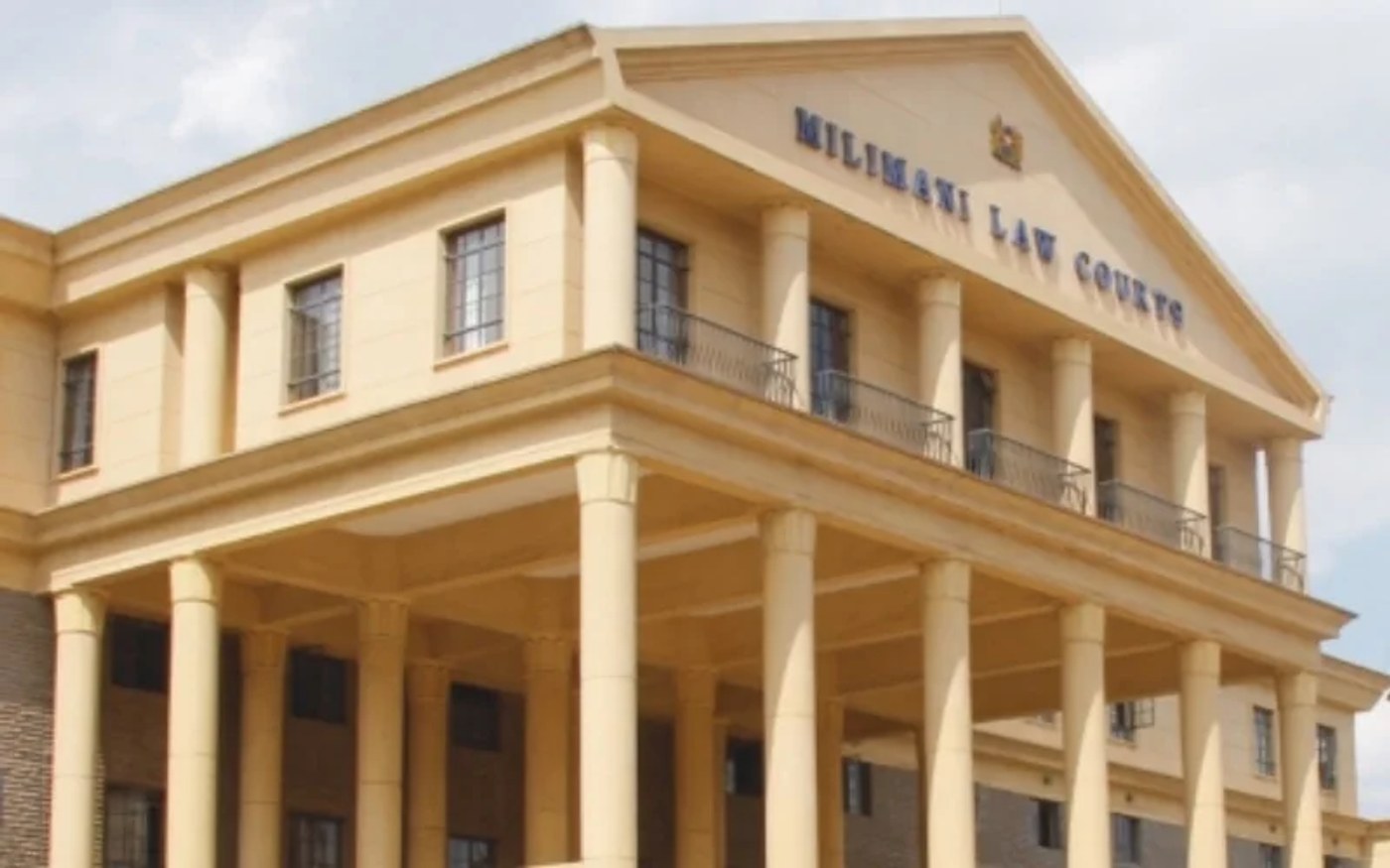 The cream-coloured colonnaded front of the Milimani Law Courts building in Nairobi.