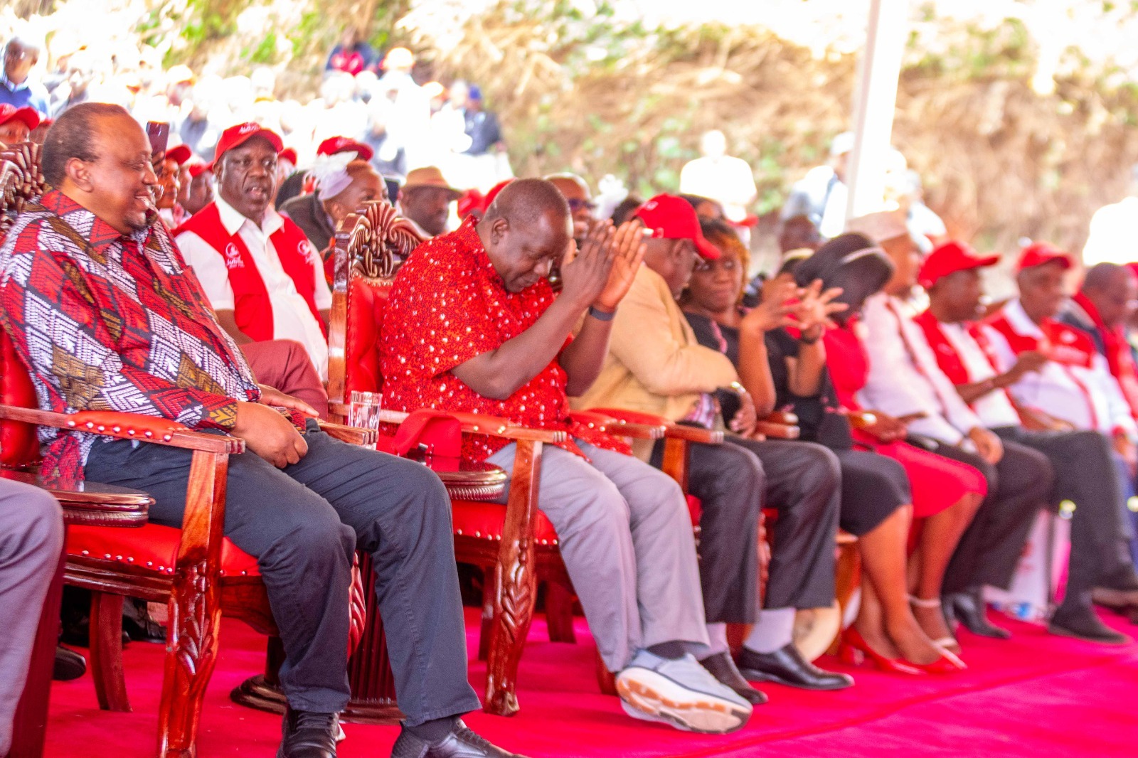 Uhuru Kenyatta sits beside Fred Matiang’i among Jubilee delegates.